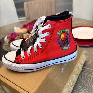 Converse Black High-Top Sneakers with Red Logo